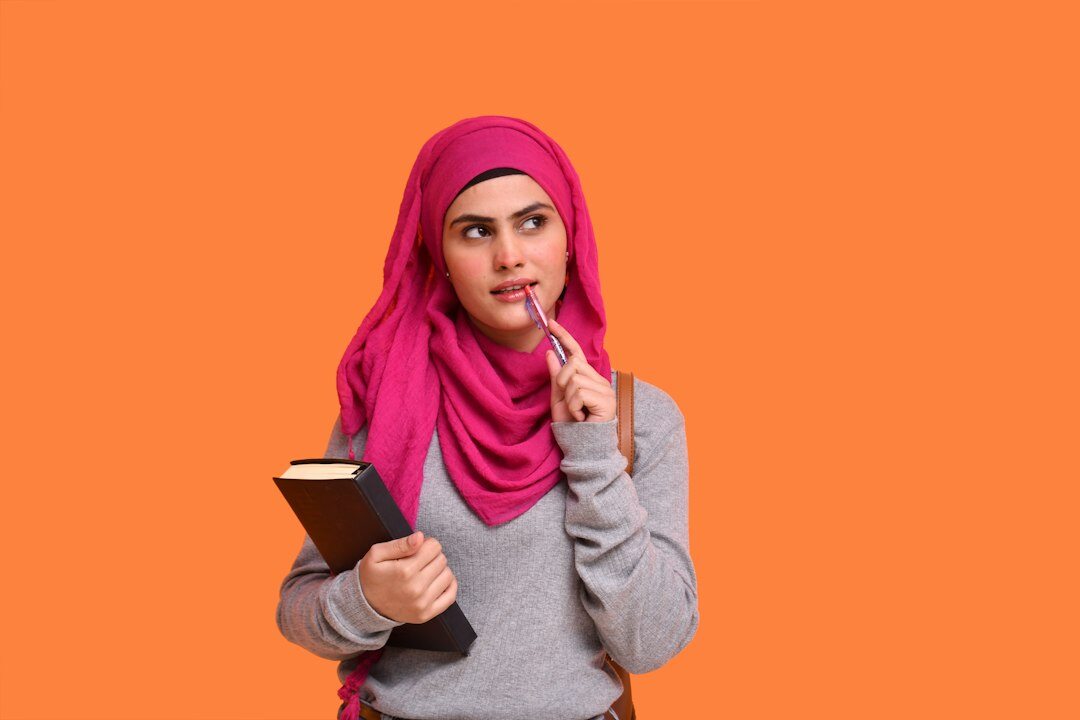 Turkish female reporter smiling with notebook